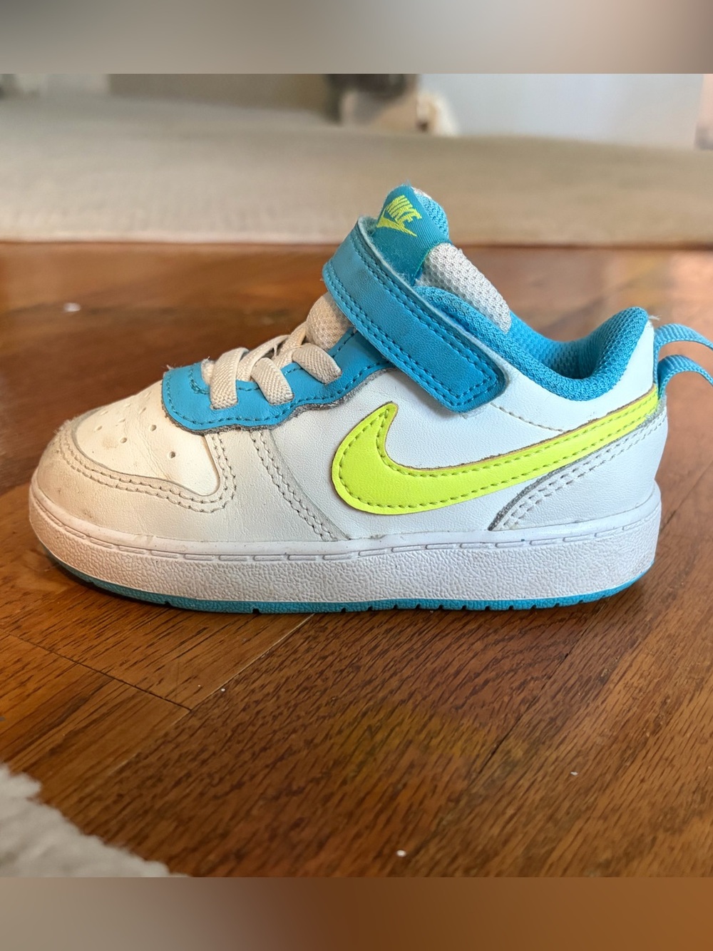 Nike Kids White Sneakers with Teal and Neon Yellow Accents